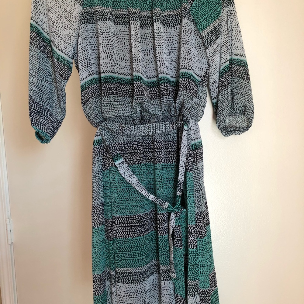 Teal, white and Black print.
